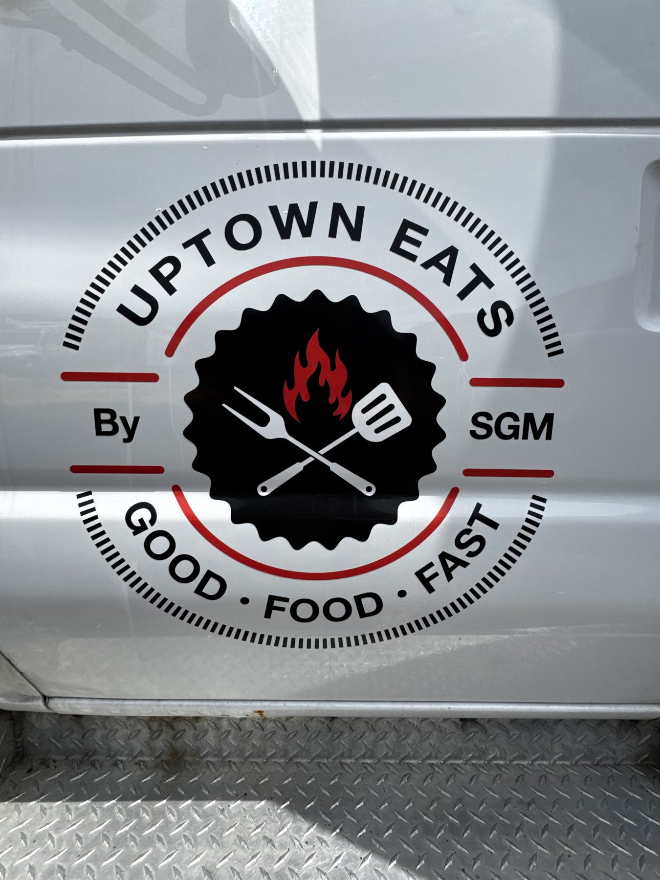 Uptown Eats by SGM logo on the truck door